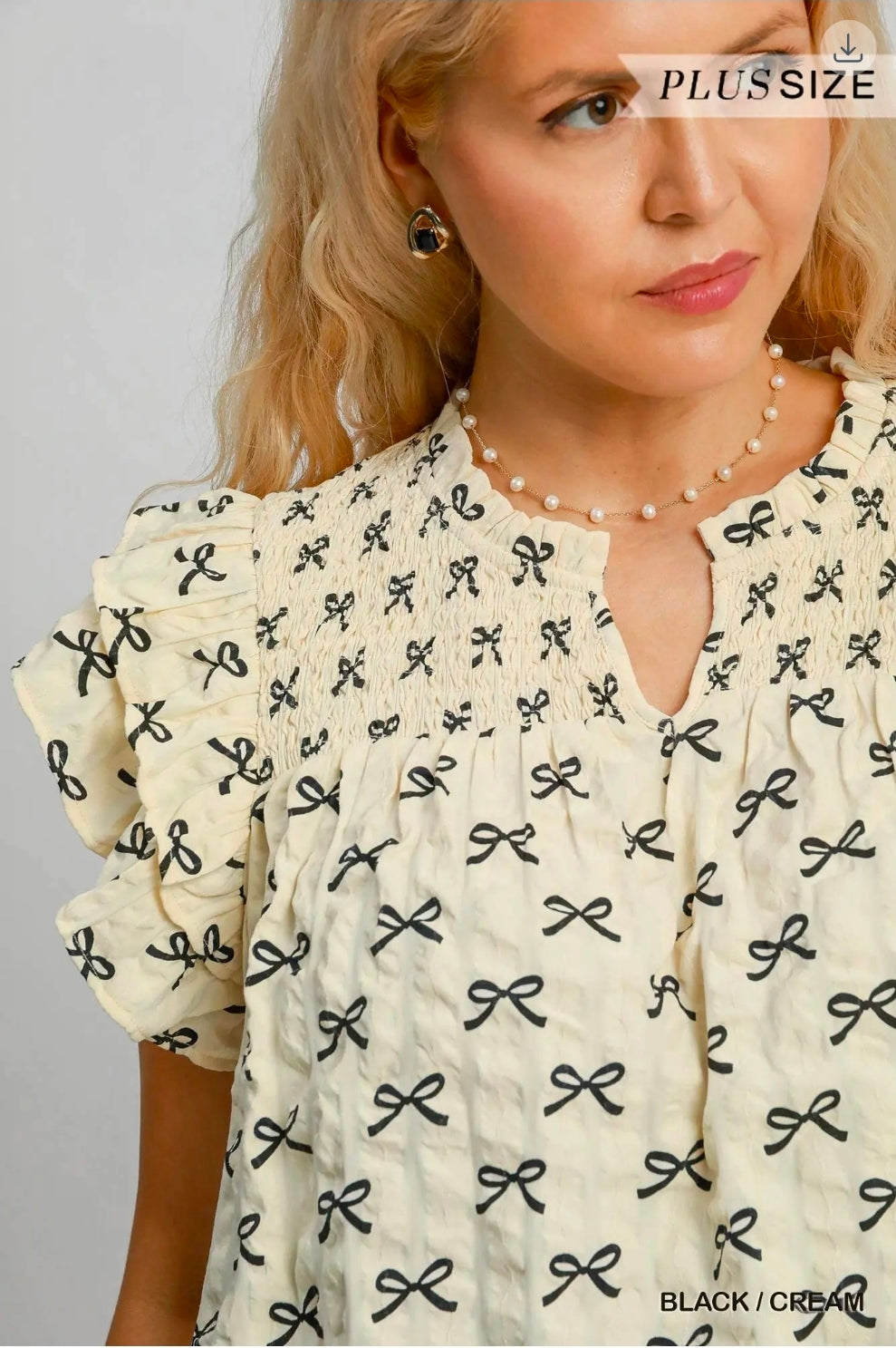Smocked ruffle sleeve top
