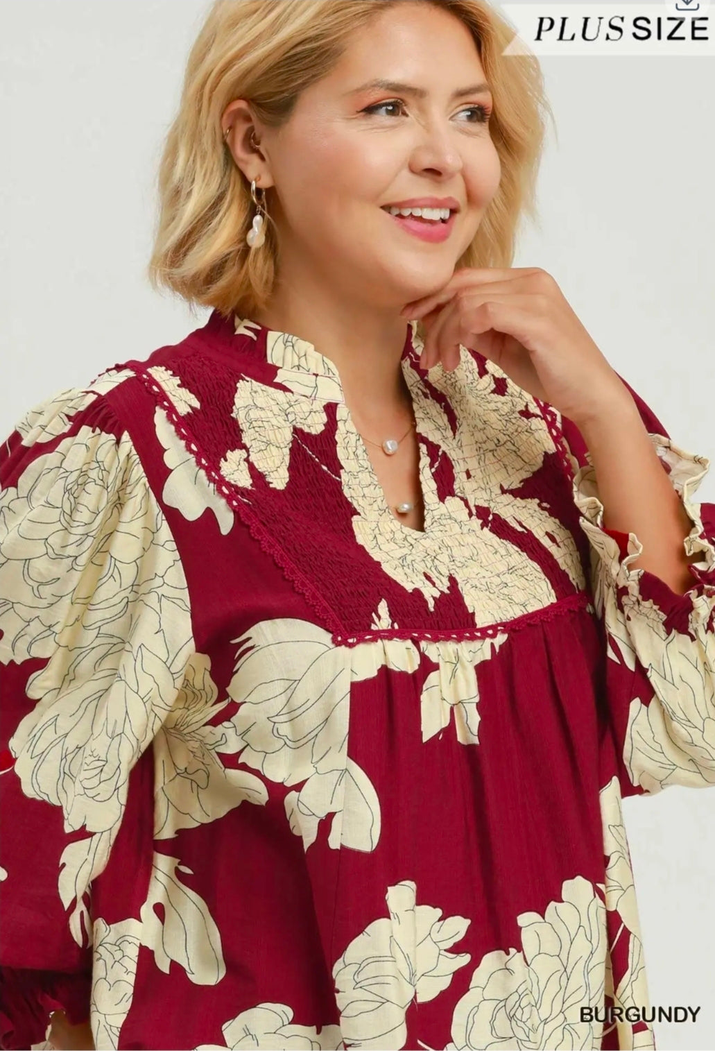 Floral smocked blouse